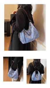 Sky blue textured multi-way tote bag showing crossbody, shoulder and backpack options