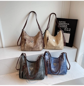 Four vintage-style large tote bags in coffee brown, beige, charcoal, and denim blue colors