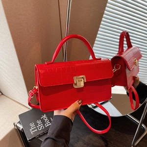 Retro red crocodile embossed square handbag with golden clasp and crossbody strap