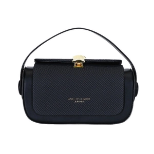 Chic black leather box bag with woven flap and wavy gold buckle for elegant styling