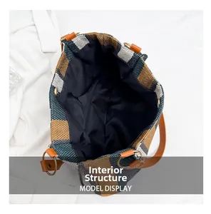 Interior structure of the woven plaid tote bag with spacious compartment and leather handles