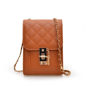 Dark brown quilted crossbody bag with gold chain strap and metal clasp on white background