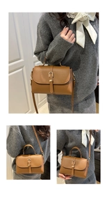 Brown lychee leather handbag featuring gold buckle details and versatile shoulder straps