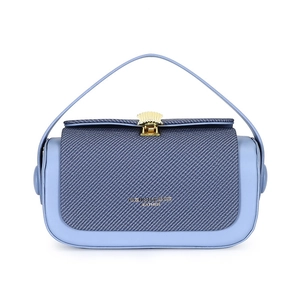 Elegant light blue leather box bag with textured flap and golden shell clasp