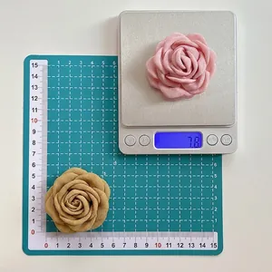 3D fabric flower phone grip stand in pink and brown, 6cm diameter size and weight display