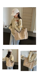 Detail view of large-capacity beige canvas tote bag with multi-pocket and wide strap