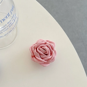 Detail of pink fabric 3D rose flower expand grip for mobile phones and tablet stands