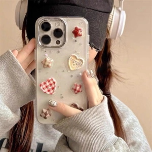 Detail of glitter iPhone case with 3D resin plaid hearts and stars charms