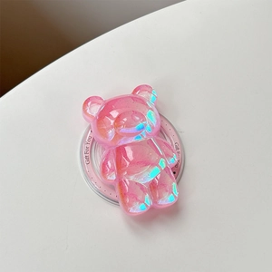 Vista macro del supporto per telefono a forma di orsetto rosa con glitter 3D