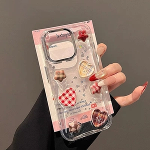 Close-up of 3D checkered hearts and stars on a transparent phone case with pink glitter insert