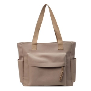 Minimalist light khaki nylon tote bag with front pocket and side bottle holders