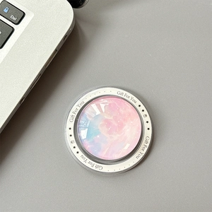 Macro detail of starry nebula phone grip with Gift For You text on white border