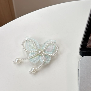 Detailed view of a light blue lace butterfly phone socket with elegant pearl bead charms