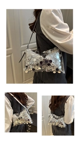 Detailed close-up showing large silver sequins and metallic texture of the shoulder bag