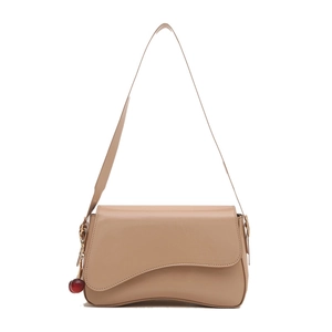 Minimalist beige underarm bag with a wavy flap design and a cherry charm detail