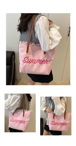 Detail of pink canvas tote with Summer embroidery, fringe trim and brown leather straps