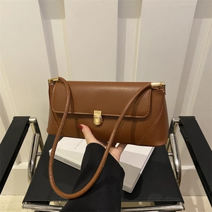 Vintage brown leather baguette shoulder bag with gold metal buckle for women