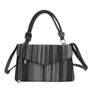 Elegant black and grey striped woven handbag with knotted handle and crossbody strap