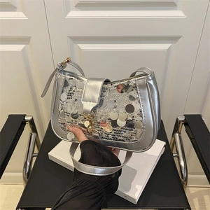 Silver sequin shoulder bag with metallic clasp and fine chain strap for summer 2025 fashion