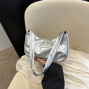 Chic silver crescent underarm bag with metallic finish for women's summer fashion