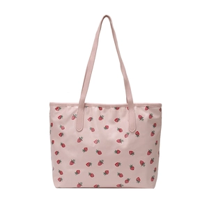 Pink tote bag for women with strawberry pattern and large capacity for daily commute