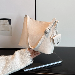 Chic cream lychee pattern leather tote bag with matching mini pouch and shoulder strap