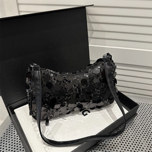 Elegant black sequin shoulder bag for women with luxury glossy finish on display box