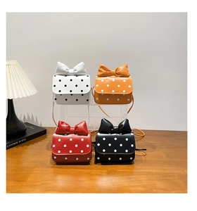 Mini children's crossbody bags with large bows and polka dots in four assorted colors