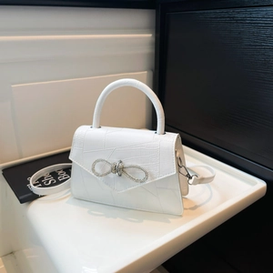 White crocodile pattern handbag with rhinestone bow and top handle for women