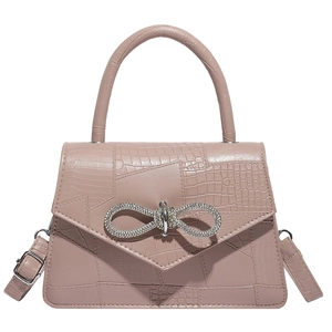 Pink stone pattern handbag with rhinestone bow buckle and adjustable strap