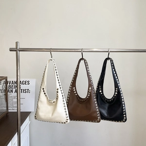 Fashionable rivet tote shoulder bags in off-white, brown, and black colors