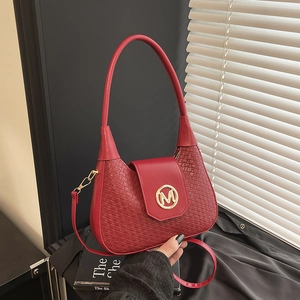 Red hobo-style shoulder bag with woven texture and gold M-logo metal buckle