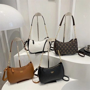 Minimalist crescent shoulder bags in four colors with leather straps and gold chains