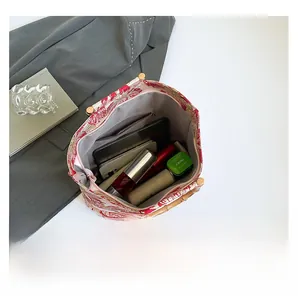 Top view of large tote bag interior showing bamboo handle and spacious main compartment