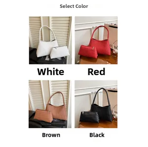 Four colors of woven hobo bags with matching small pouches in white, red, brown, and black