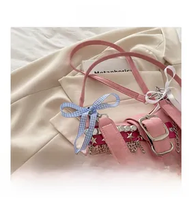 Pink punk-style PU leather handbag with silver studs and chain detailing