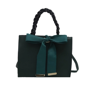 Dark green square handbag with satin bow and black woven handle for women's elegant style