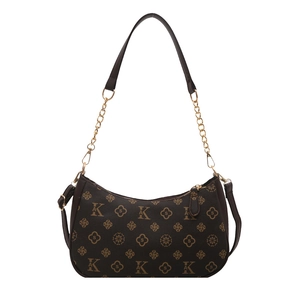 Sac sous le bras marron avec motifs monogramme vintage et bandoulière chaîne dorée