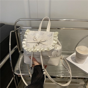 Elegant cream bow backpack with satin jacquard texture and pearl charm for women