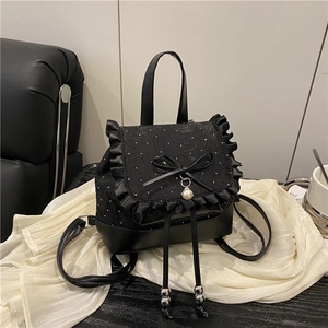 Elegant black bow backpack with lace ruffles, white polka dots and pearl pendant detail