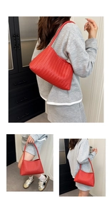 Detail of red woven leather shoulder bag with Intrecciato craftsmanship and strap