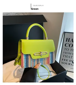 Detail of woven pattern and gold buckle on a neon green fashion crossbody bag