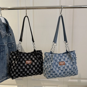 Fashionable denim checkerboard tote bag with metal chain strap in blue and black colors
