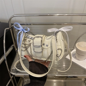 Chic cream PU leather shoulder bag with silver star studs and metal chain straps