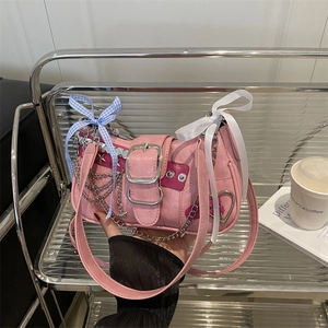 Pink Y2K punk shoulder bag with silver chunky chain and decorative ribbon bows
