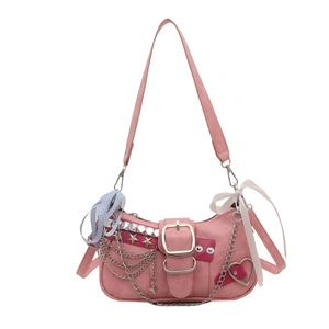 Pink minimalist shoulder bag with silver chains, star studs, and decorative ribbons