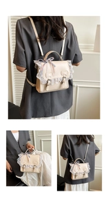 Detail showing the cream PU leather backpack with lace trim and bowknot accents