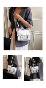 Close-up of silver PU leather bag with white lace trim and decorative bows detail