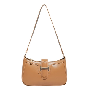 Chic tan faux leather baguette shoulder bag with minimalist design and golden hardware