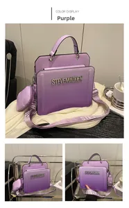 Detail view of purple Steve Madden handbag set with rhinestone logo and woven strap